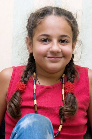 The happy girl with plats. の写真素材