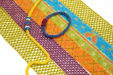 Needlework from multicolored beads. 