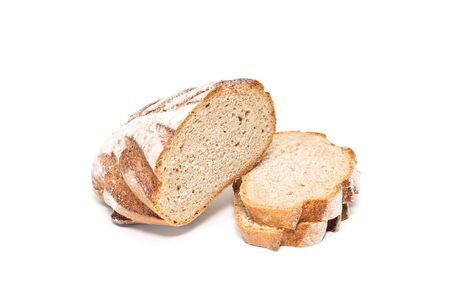 Fresh sliced loaf of bread on a white background.