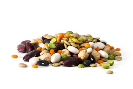 Multicolored mixed dried beans on a white background
