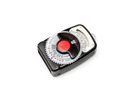 Vintage light meter isolated on white background.の写真素材