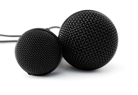 Two black microphones isolated on a white background.の写真素材