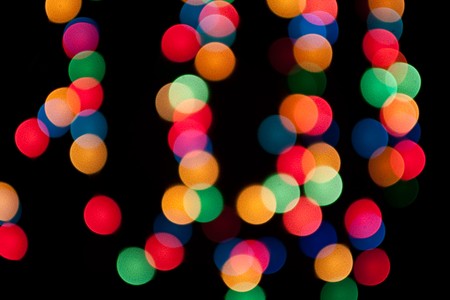 Abstract bokeh lights on a dark background.  の写真素材