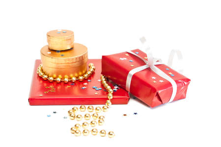 Red and gold gift boxes isolated on a white background.