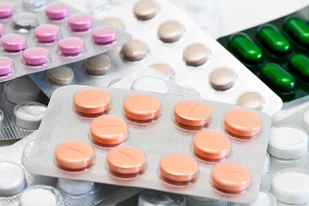 Packs of pills isolated on white background.