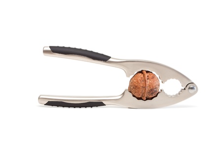 Nutcracker with walnut isolated on a white background.
