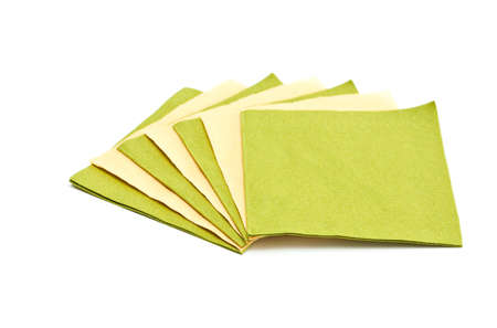 Green and yellow napkins isolated on a white background.の写真素材