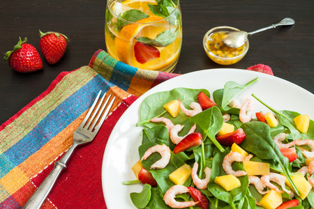 Fresh spinach fruit salad.の写真素材