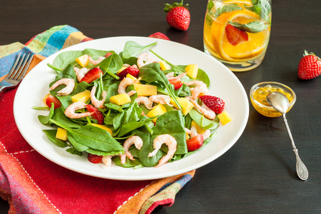 Fresh spinach fruit salad.の写真素材