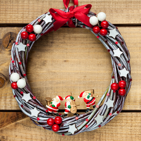 Hand made Christmas wreath on woodenの写真素材
