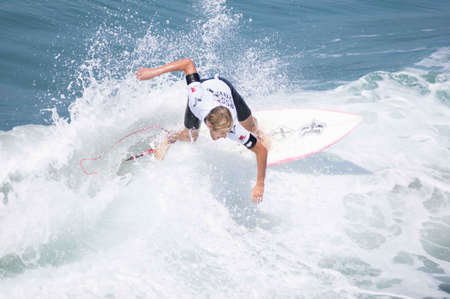 Pacific Beach, San Diego Revolt Summer Surf Series 6.0 08/17/2012 - Surfer Carving a Waveのeditorial素材
