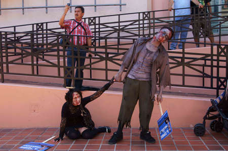 Downtown San Diego 08/20/2012 Zombie Rally - Zombie Boyfriend and Girlfriendのeditorial素材