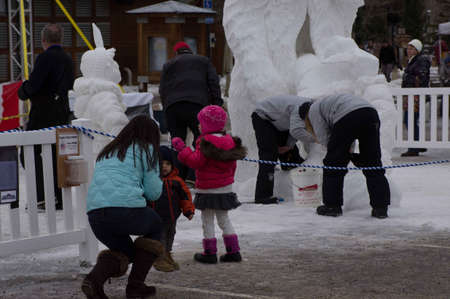 Breckenridge, Colorado  01/26/2013- Ice Sculpture Competition  Fan Photoのeditorial素材