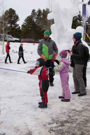 Breckenridge, Colorado  01/26/2013- Ice Sculpture Competition Fan Photoのeditorial素材