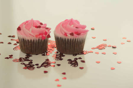 Valentine s Day Cupcakes and Heart Confettiの写真素材