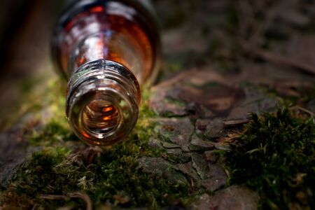 close up of a mouth of a small bottle with red stainsの写真素材