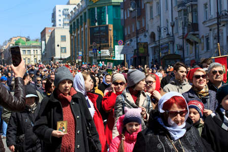 Vladivostok, Russia -April 08, 2018: People at the Easter procession in the center of Vladivostok.のeditorial素材