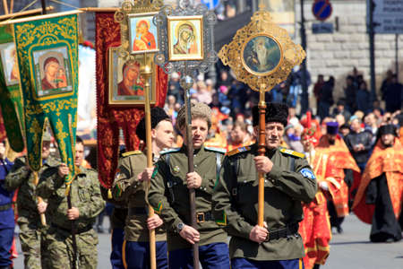Vladivostok, Russia -April 08, 2018: Priests and Cossacks at the Easter procession in the center of...