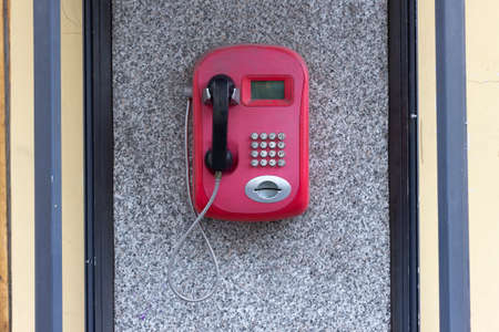 Old street phone. An outdated way of communication.の写真素材