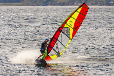 Vladivostok, Russia - September, 30, 2018: A windsurfer in the strait between Tokarevsky lighthouse and Elena Island in Vladivostok.のeditorial素材