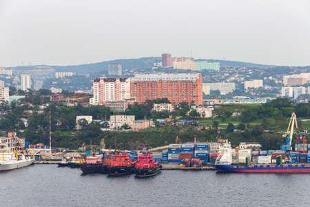 Vladivostok, Russia - September, 05, 2015: Fishing, rescue ships and container ships at the quays of the Fishing port in Vladivostok.のeditorial素材