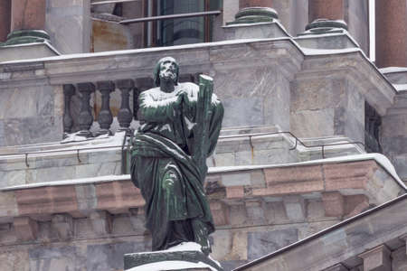 St. Petersburg, Russia - February, 21, 2021: Bronze statues on the building of St. Isaac's Cathedral in St. Petersburg in winter.のeditorial素材