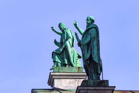 St. Petersburg, Russia - March, 06, 2021: Bronze sculptures on the roof of St. Isaac's Cathedral in St. Petersburg.のeditorial素材