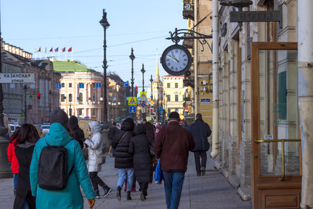 St. Petersburg, Russia - March, 03, 2021: People walking along Nevsky Prospekt in St. Petersburg in the direction of the Palace Square.のeditorial素材