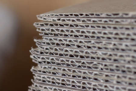 The ends of the side surfaces of dense sheets of cardboard.の写真素材