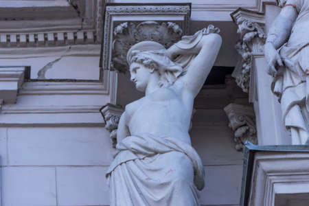 St. Petersburg, Russia - June, 24, 2021: Sculptures on the facades of buildings in St. Petersburg.