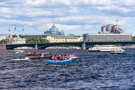 St. Petersburg, Russia - July, 24,2021: Accumulation of water transport modes on the Neva River in St. Petersburg. View of the Neva River from the embankment.のeditorial素材