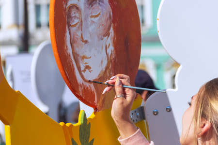 St. Petersburg, Russia - Sptember, 05,2021: The hand of a street artist painting a picture.のeditorial素材