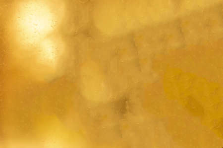 The surface of a window pane stained and streaked by dried raindrops. Blurred texture with smooth transitions.の写真素材