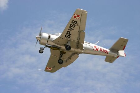 Small aircraft at the blue sky