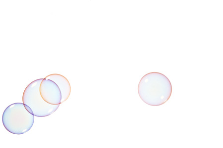 Group of soap bubbles on a white backgroundの写真素材