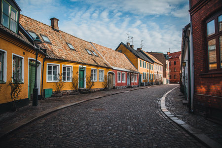 View down the cobblestone streets in Lund, Swedenの写真素材