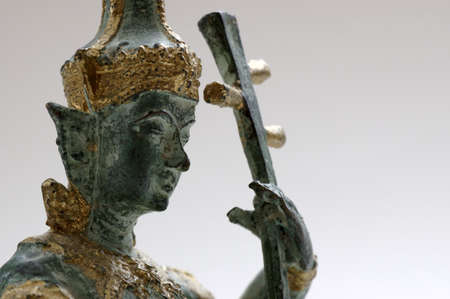 Detail of Hindu Statuette Playing Stringed Instrumentの写真素材