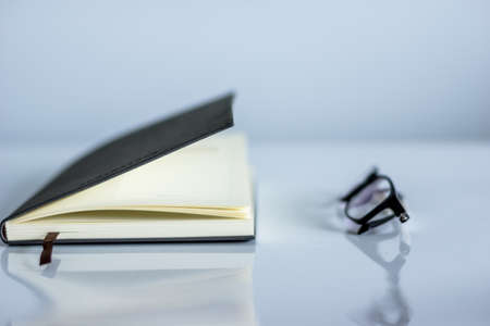 Books and glassesの写真素材
