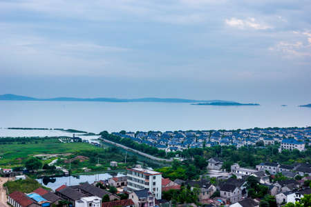 Landscape scenery view of a city at lake sideの写真素材