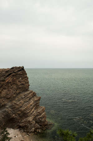 View of a cliff by the seaの写真素材