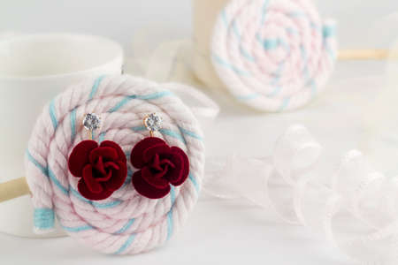 Red pretty earrings on lollipops Earringの写真素材