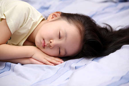 cute asian child, portrait photos, close-up of sleepの写真素材