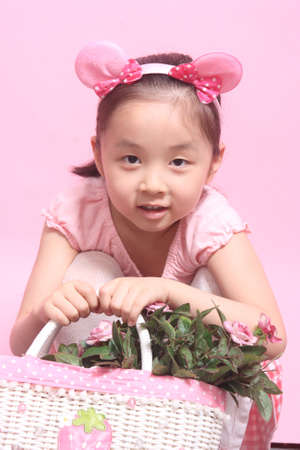 children before the pink background, the asian characters, taken in 2011の写真素材