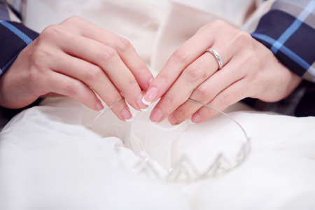 The beautiful bride, hand and Jewelry, shooting at the wedding site