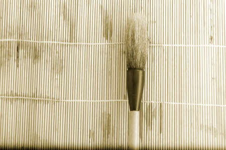 Old bamboo curtain with a brush,chinese traditional artの写真素材