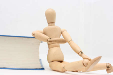 The relationship between the puppet and bookの写真素材