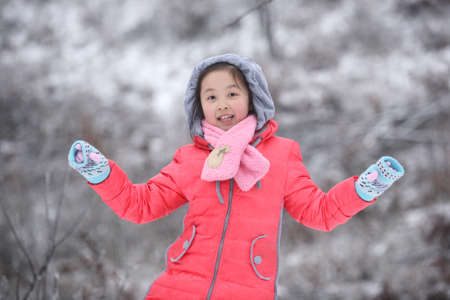 winter photo of a girl, happy smile