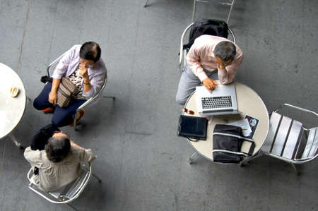 working man and chatting person