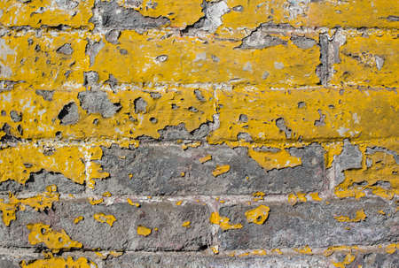 Mottled colors covered with scratches stained wall close-upの写真素材