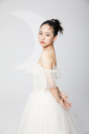 Half-length image of elegant female in wedding dressの写真素材